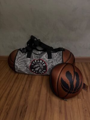 94d4cc6b-7cef-4fc2-ba5d-b0aaa198a79e Bolsa Mala Basquete NBA ( Raptors)