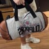 add887ce-4d74-4b64-9332-50cb0f8ae6e4 Bolsa Mala Basquete NBA (Clippers)